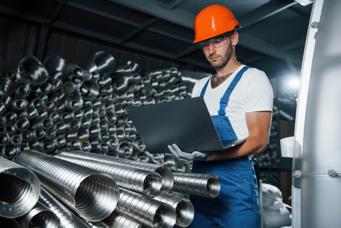 661510e92bb771a81a3380fa_2021_06_rsz_conception-of-manufacturing-man-in-uniform-works-o-sr3xsm6